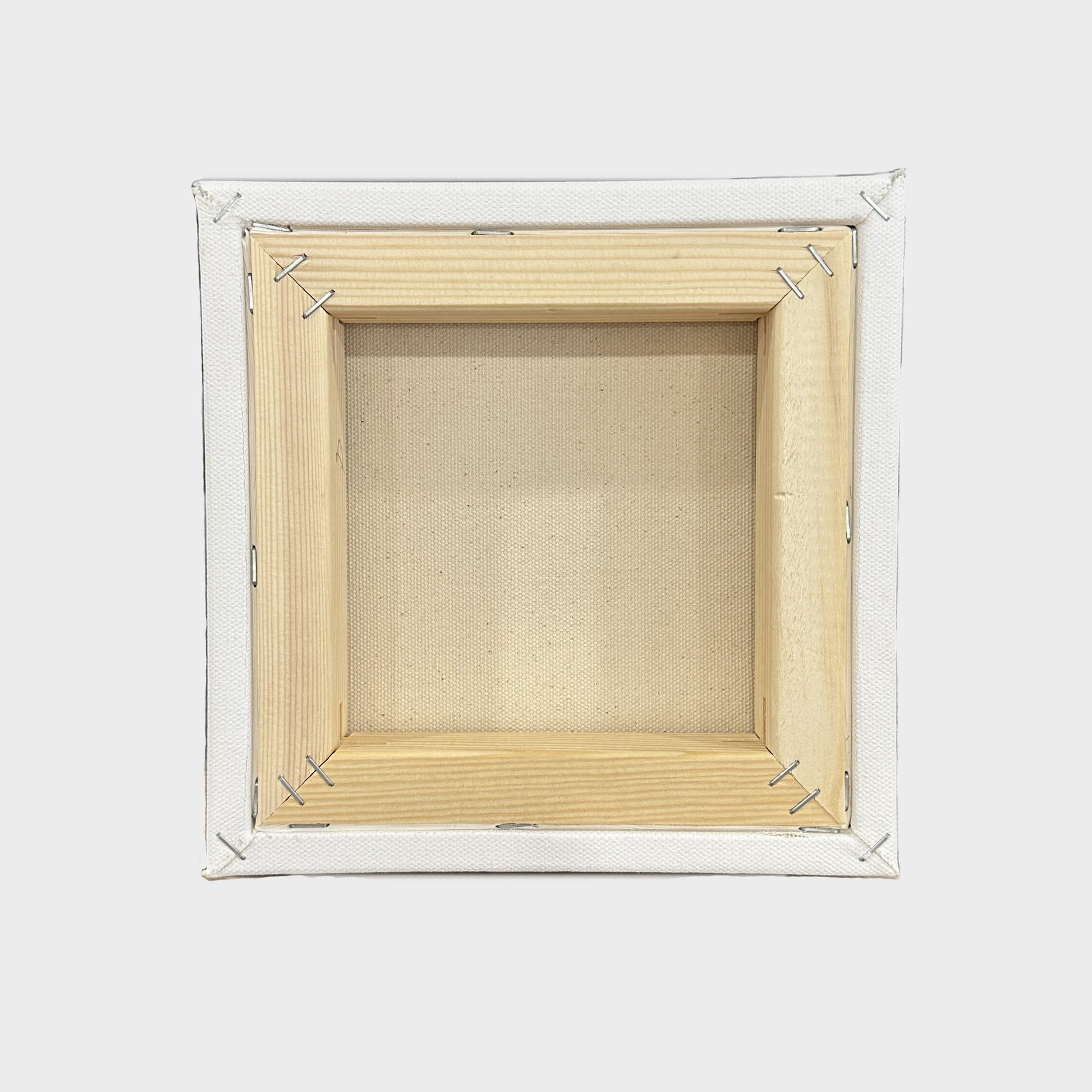 Back angle view of the 8x8 inches (20.3x20.3 cm) canvas, revealing the meticulous craftsmanship behind the oil painting of a white cat in sunlight. This perspective showcases the quality of the canvas , ideal for home decor.